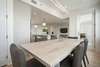 DINING AREA ADJACENT TO KITCHEN AND LIVING