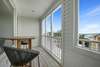 BALCONY OFF LIVING AREA W/ SEATING FOR 2 AND VIEWS