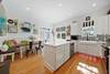 ACROSS FROM OPEN LIVING IS THE RENOVATED KITCHEN & DINING AREA ACROSS FROM OPEN LIVING IS THE RENOVATED KITCHEN & DINING AREA