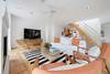 LIVING AREA WITH SEATING AND FLATSCREEN TV LIVING AREA WITH SEATING AND FLATSCREEN TV