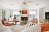 LIVING WITH PLENTY OF NATURAL LIGHT AND COMFORTABLE SEATIG FOR A LIVING WITH PLENTY OF NATURAL LIGHT AND COMFORTABLE SEATIG FOR A