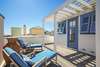PRIVATE DECK WITH LOUNGE SEATING AND VIEWS