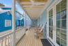 LARGE, FURNISHED FRONT PORCH WITH ADIRONDACK SEATING LARGE, FURNISHED FRONT PORCH WITH ADIRONDACK SEATING