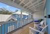 BALCONY WITH LOUNGE AND ADIRONDACK SEATING BALCONY WITH LOUNGE AND ADIRONDACK SEATING