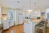 KITCHEN W/BREAKFAST BAR SEATING FOR FOUR KITCHEN W/BREAKFAST BAR SEATING FOR FOUR