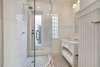 DOWNSTAIRS SHARED FULL BATHROOM OFF BEDROOMS