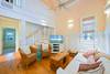 LIVING AREA WITH LARGE SOFA AND TWO CLUB CHAIRS LIVING AREA WITH LARGE SOFA AND TWO CLUB CHAIRS
