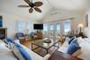OPEN LIVING AREA W/MOUNTED FLATSCREEN TV OPEN LIVING AREA W/MOUNTED FLATSCREEN TV