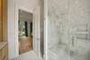 LARGE GLASS ENCLOSED WALK IN MARBLE SHOWER