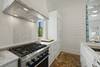 4 BURNER GAS STOVE AND LARGE CUSTOM BUILT IN FRIDGE 4 BURNER GAS STOVE AND LARGE CUSTOM BUILT IN FRIDGE