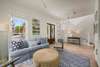 LIVING WITH COMFORTABLE SOFA & ADDITIONAL SEATING