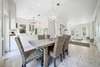 DINING AREA ADJACENT TO KITCHEN AND LIVING AREA