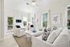 MODERN LIVING ROOM WITH MOUNTED FLAT SCREEN TV