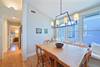 ADJACENT CUSTOM BUILT IN DINING AREA, COMFORTABLY SEATS SIX ADJACENT CUSTOM BUILT IN DINING AREA, COMFORTABLY SEATS SIX