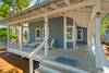 WELCOMING OPEN AIR WRAP AROUND FURNISHED FRONT PORCH WELCOMING OPEN AIR WRAP AROUND FURNISHED FRONT PORCH