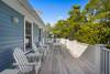 GENEROUS, OPEN AIR DECK W/ ADIRONDACK SEATING & LOUNGE GENEROUS, OPEN AIR DECK W/ ADIRONDACK SEATING & LOUNGE