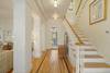 STAIRCASE LEADING TO 2ND LEVEL & FOUR MORE BEDROOMS UP STAIRCASE LEADING TO 2ND LEVEL & FOUR MORE BEDROOMS UP