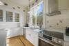 KITCHEN W/FOUR BURNER ELECTRICAL STOVE TOP, PLENTY OF STORAGE KITCHEN W/FOUR BURNER ELECTRICAL STOVE TOP, PLENTY OF STORAGE