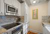 KITCHEN WITH NATURAL LIGHT SHINING THROUGH WINDOW KITCHEN WITH NATURAL LIGHT SHINING THROUGH WINDOW