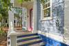 FRONT PORCH AND OUTDOOR SHOWER BY ENTRY DOOR FRONT PORCH AND OUTDOOR SHOWER BY ENTRY DOOR