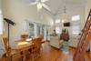 OPEN FIRST LEVEL FACING LIVING AND DINING AREAS OPEN FIRST LEVEL FACING LIVING AND DINING AREAS