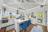 KITCHEN WITH HIGH CEILINGS AND A COMMUNAL FEEL KITCHEN WITH HIGH CEILINGS AND A COMMUNAL FEEL