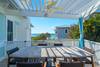 STUNNING GULF VIEWS FROM THE OUTDOOR DINING AREA STUNNING GULF VIEWS FROM THE OUTDOOR DINING AREA