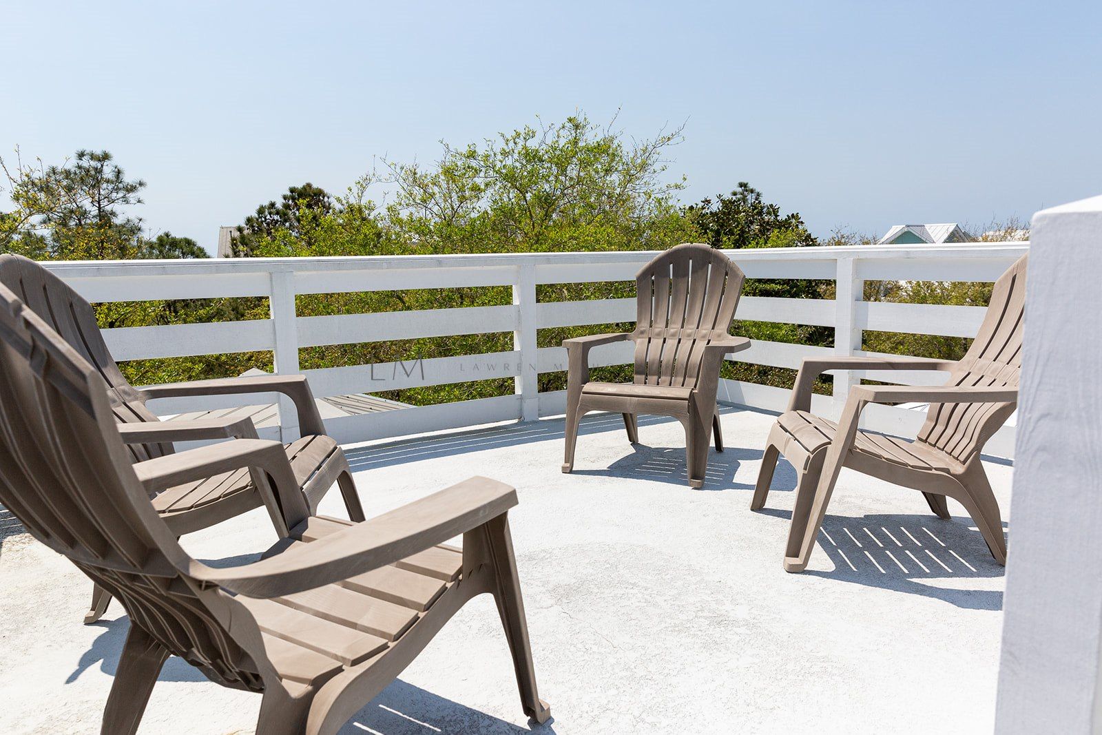 LARGE OPEN AIR ROOF TOP DECK W/SEATING FOR FOUR