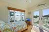 TOWER ROOM WITH LARGE WINDOWS FACING DECK TOWER ROOM WITH LARGE WINDOWS FACING DECK