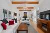 OPEN LIVING WITH SLIPCOVER SEATING AND FLATSCREEN