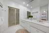 MARBLE BATHROOM W/DUAL VANITIES & SHOWER