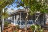 GENEROUSE WRAP AROUND PORCH AT ENTRANCE GENEROUSE WRAP AROUND PORCH AT ENTRANCE