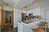 KITCHEN WITH BARTOP SEATING FOR THREE KITCHEN WITH BARTOP SEATING FOR THREE
