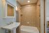 ENSUITE, FULL BATH W/ TUB SHOWER COMBO AND SINGLE VANITY