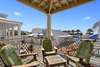 LARGE BALCONY WITH SEATING AREAS THROUGHOUT