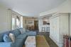 OPEN LIVING W/ LARGE SECTIONAL, FOLDS OUT TO SLEEPER OPEN LIVING W/ LARGE SECTIONAL, FOLDS OUT TO SLEEPER