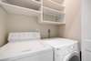 LAUNDRY AREA W/FULL SIZE WASHER AND DRYER
