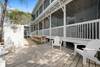 THREE PORCHES AND OUTSIDE DECK LOUNGE AREA & DINING THREE PORCHES AND OUTSIDE DECK LOUNGE AREA & DINING