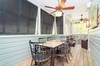 LARGE SPACIOUS PORCH LENGTH OF HOME, DINING FOR 10 LARGE SPACIOUS PORCH LENGTH OF HOME, DINING FOR 10