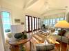 LARGE OPEN LIVING ROOM WITH GULF VIEWS THROUGHOUT LARGE OPEN LIVING ROOM WITH GULF VIEWS THROUGHOUT