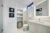 RENOVATED BATHROOM; MARBLE VANITY, BACKLIT MIRROR, HEATED FLOOR RENOVATED BATHROOM; MARBLE VANITY, BACKLIT MIRROR, HEATED FLOOR