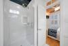 GLASS ENCLOSED WALK IN SHOWER W/RAINHEAD GLASS ENCLOSED WALK IN SHOWER W/RAINHEAD