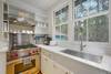 LARGE SINK AT REAR WINDOW W/WOLF OVEN & COOKTOP LARGE SINK AT REAR WINDOW W/WOLF OVEN & COOKTOP