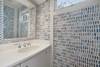ADJACENT HALF BATH OFF LIVING AREAS & KITCHEN ADJACENT HALF BATH OFF LIVING AREAS & KITCHEN