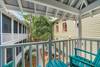 OPEN AIR COVERED BALCONY W/ADIRONDACK SEATING FOR TWO OPEN AIR COVERED BALCONY W/ADIRONDACK SEATING FOR TWO