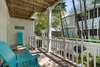 SPACIOUS FRONT PORCH NEXT TO OUTDOOR GRILL