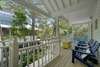 FURNISHED OPEN AIR DECK W/LOUNGE SEATING OFF BEDROOMS