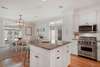 OPEN KITCHEN FACING DINING AREA