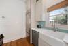VIEW TO LARGE SUB ZERO FRIDGE, DISHWASHER, FARMHOUSE SINK VIEW TO LARGE SUB ZERO FRIDGE, DISHWASHER, FARMHOUSE SINK