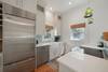 RENOVATED KITCHEN WITH QUARTZ COUNTERS & FARMHOUSE SINK RENOVATED KITCHEN WITH QUARTZ COUNTERS & FARMHOUSE SINK
